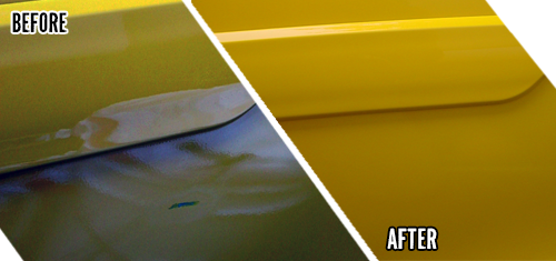 A close up of the side of a car with yellow paint.